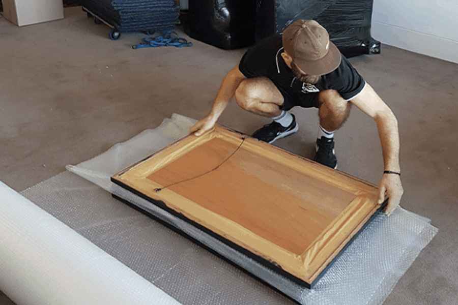 How Movers and Packers Handle Artwork and Mirrors Safely During a Move